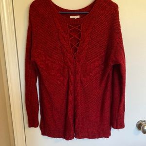 Ruby red sweater.